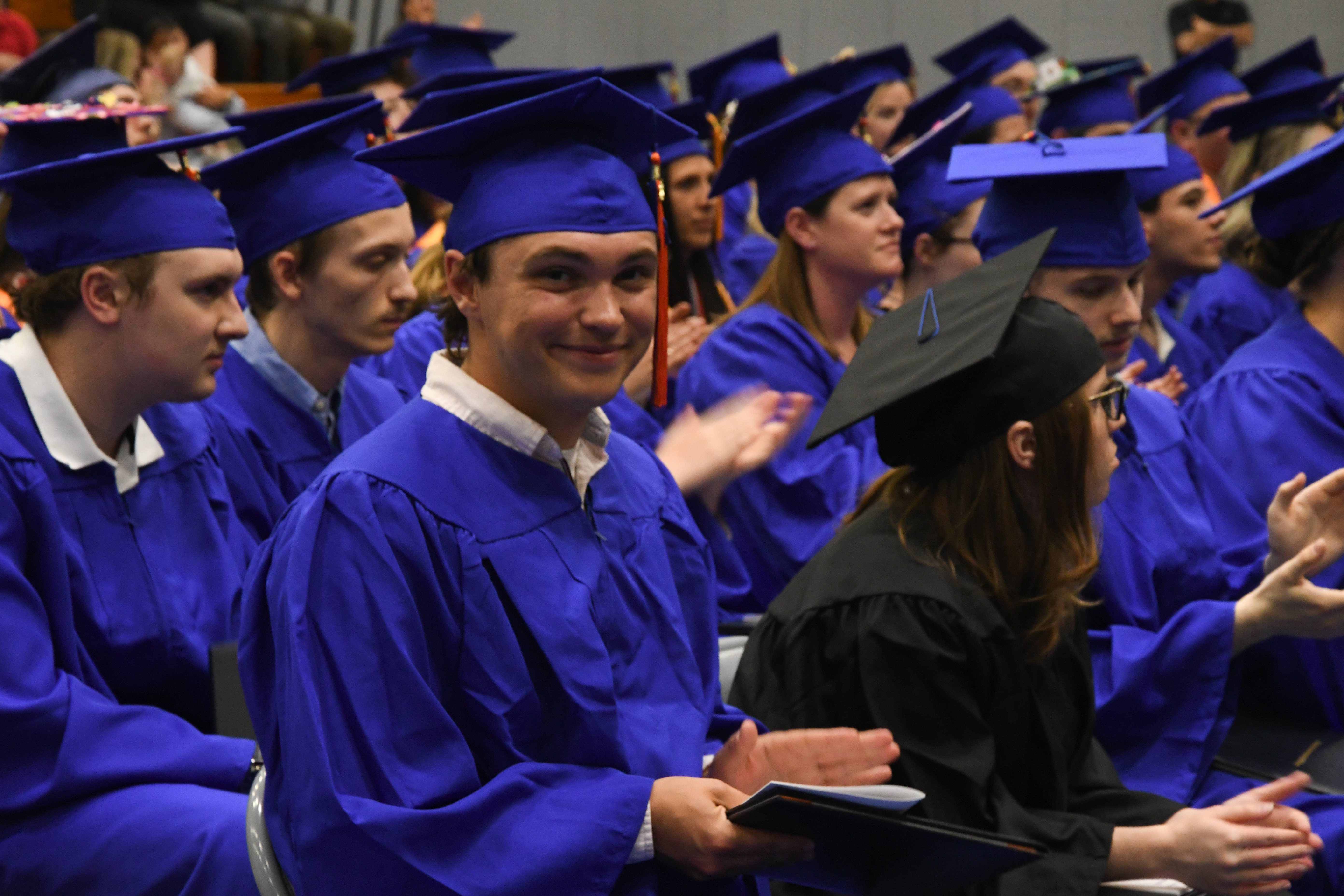 Student Smiling at Graduation 